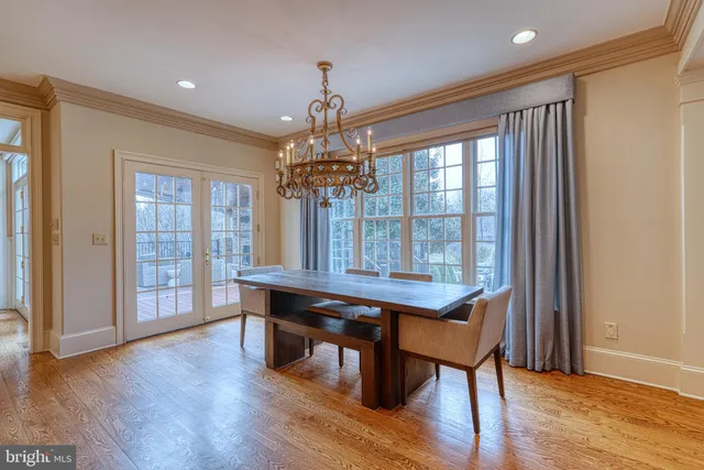 a living room with furniture a couch and a dresser