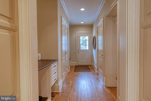 a bedroom with a large bed and a large window