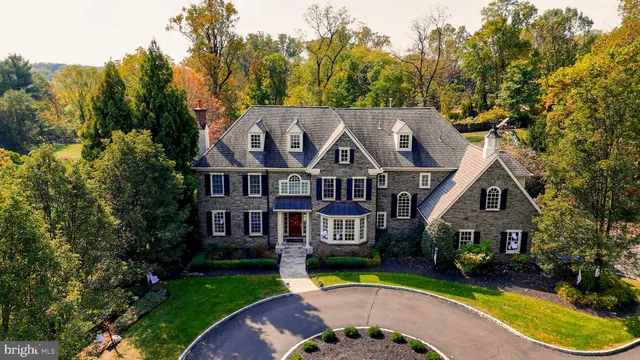 a front view of a house with yard