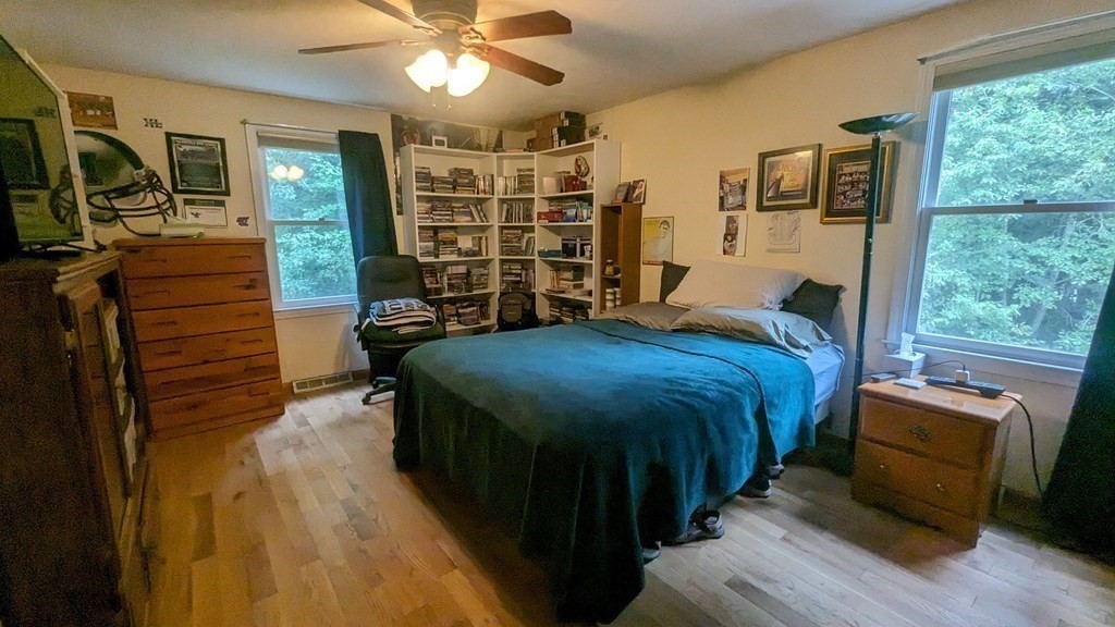 10 Van Gemert Drive Mansfield, MA 02048 - Photo 15 of 33 a bed room with a bed window and a walk in closet