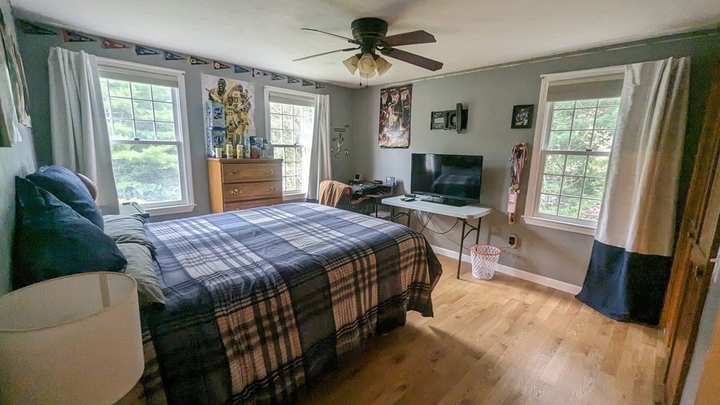 10 Van Gemert Drive Mansfield, MA 02048 - Photo 16 of 33 a bedroom with a bed television and window