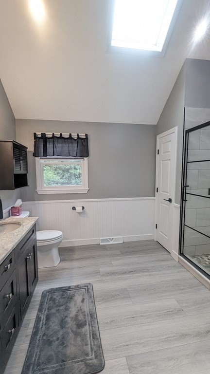 10 Van Gemert Drive Mansfield, MA 02048 - Photo 18 of 33 a spacious bathroom with a toilet a sink and a mirror