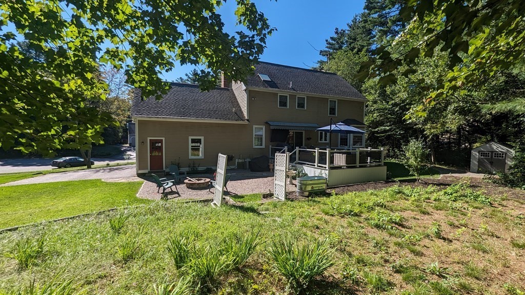 10 Van Gemert Drive Mansfield, MA 02048 - Photo 28 of 33 a view of a house with backyard porch and sitting area