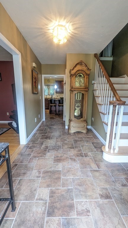 10 Van Gemert Drive Mansfield, MA 02048 - Photo 3 of 33 a view of an entryway with a livingroom
