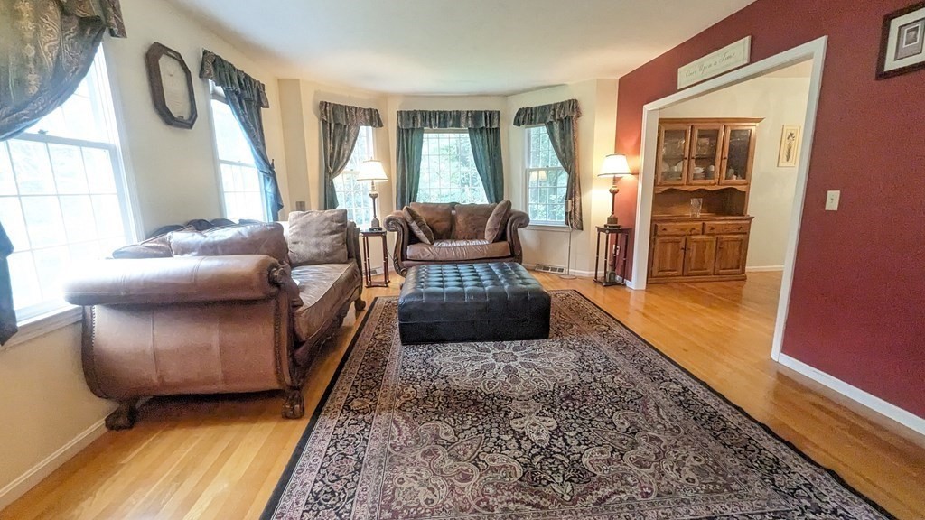10 Van Gemert Drive Mansfield, MA 02048 - Photo 7 of 33 a living room with furniture and a rug