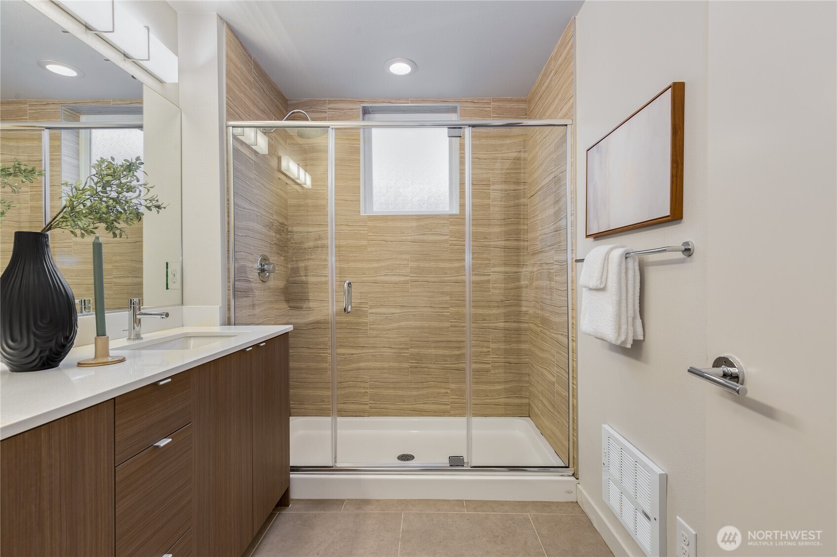 4272 Southwest Bradford Street Seattle, WA 98116 - Photo 24 of 28 a bathroom with a bathtub and a sink