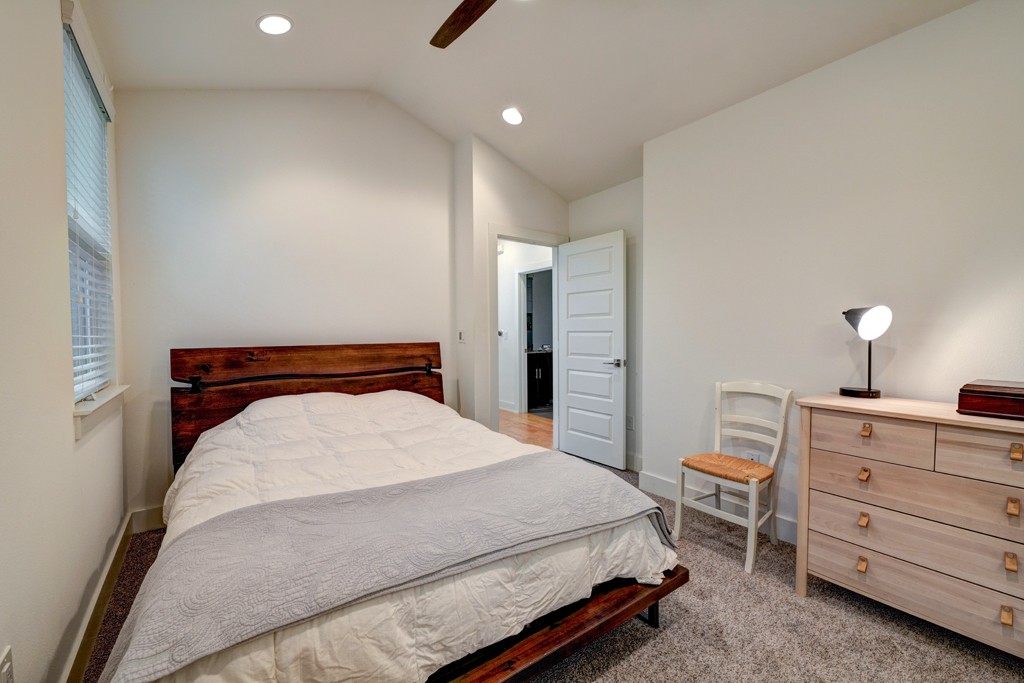 1300 Walnut Avenue, Unit B Austin, TX 78702 - Photo 9 of 15 a bedroom with a bed and a dresser