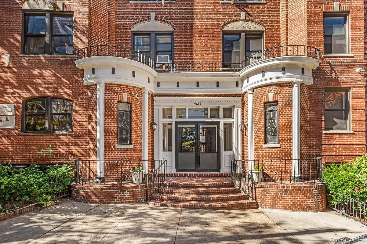 96-11 65th Road, Unit 1 Queens, NY 11374 - Photo 8 of 10 a front view of a multi story residential apartment building