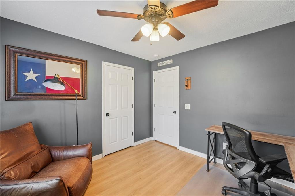 1600 Mountain Trace Canton, GA 30114 - Photo 23 of 50 a bedroom with a bed and a chandelier