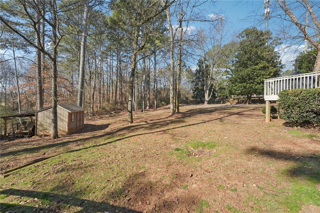 1600 Mountain Trace Canton, GA 30114 - Photo 36 of 50 a view of a backyard with large trees