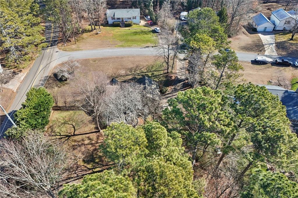 1600 Mountain Trace Canton, GA 30114 - Photo 44 of 50 a view of a yard with plants and large trees