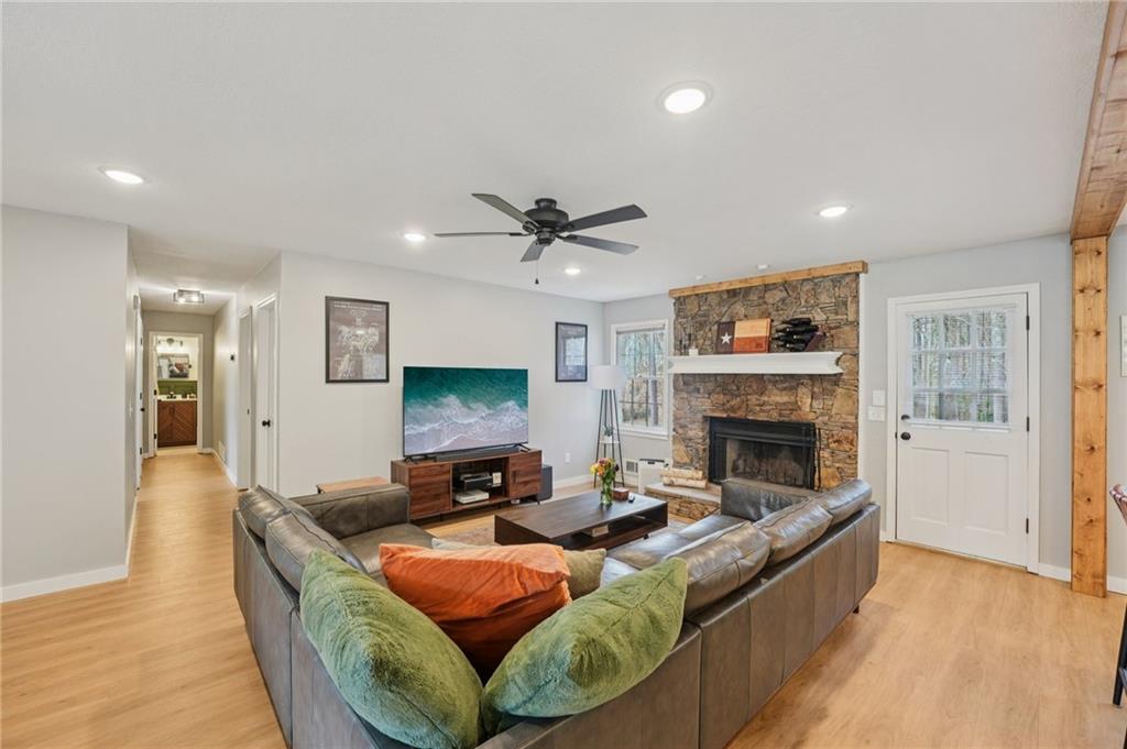 1600 Mountain Trace Canton, GA 30114 - Photo 8 of 50 a living room with fireplace furniture and a wooden floor