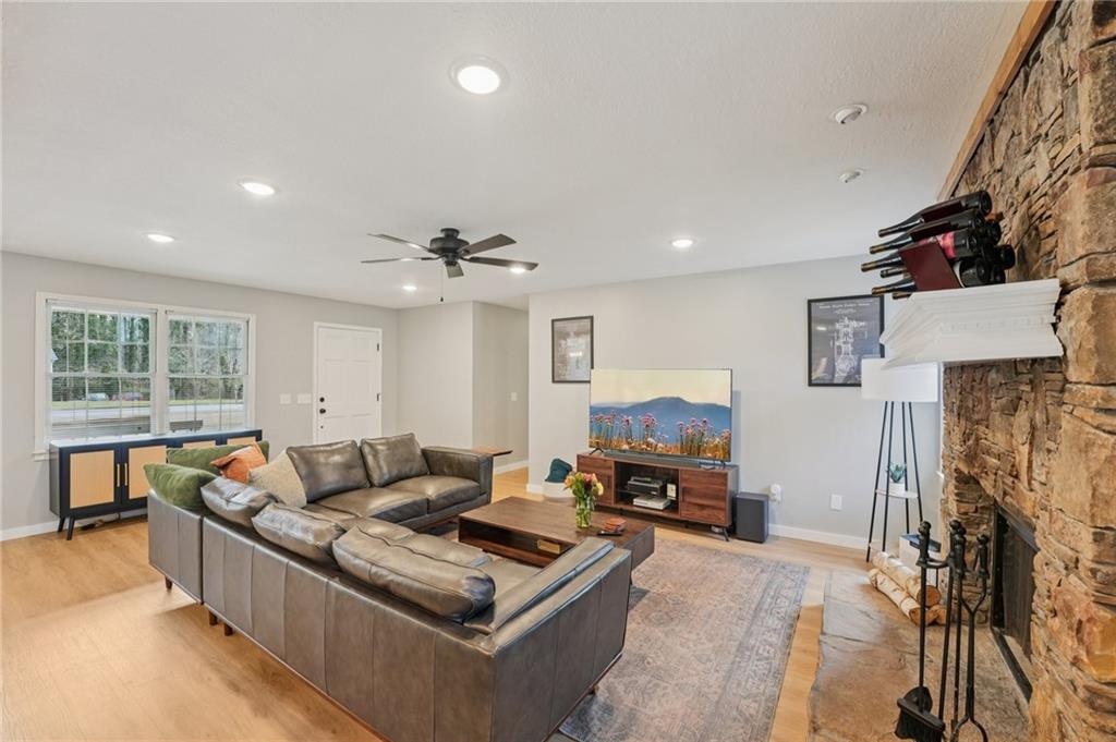 1600 Mountain Trace Canton, GA 30114 - Photo 9 of 50 a living room with furniture and a flat screen tv