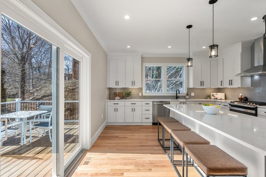 22 Yerxa Road Arlington, MA 02474 - Photo 5 of 42 a kitchen with a sink stove and cabinets