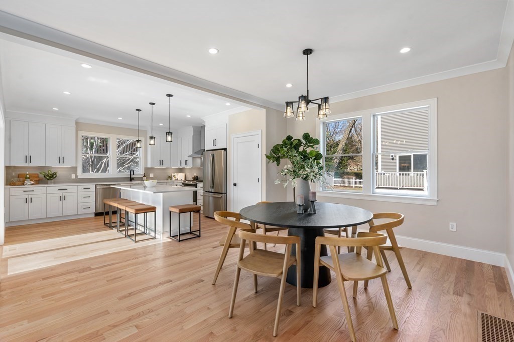22 Yerxa Road Arlington, MA 02474 - Photo 6 of 42 a view of a dining room with furniture window and wooden floor