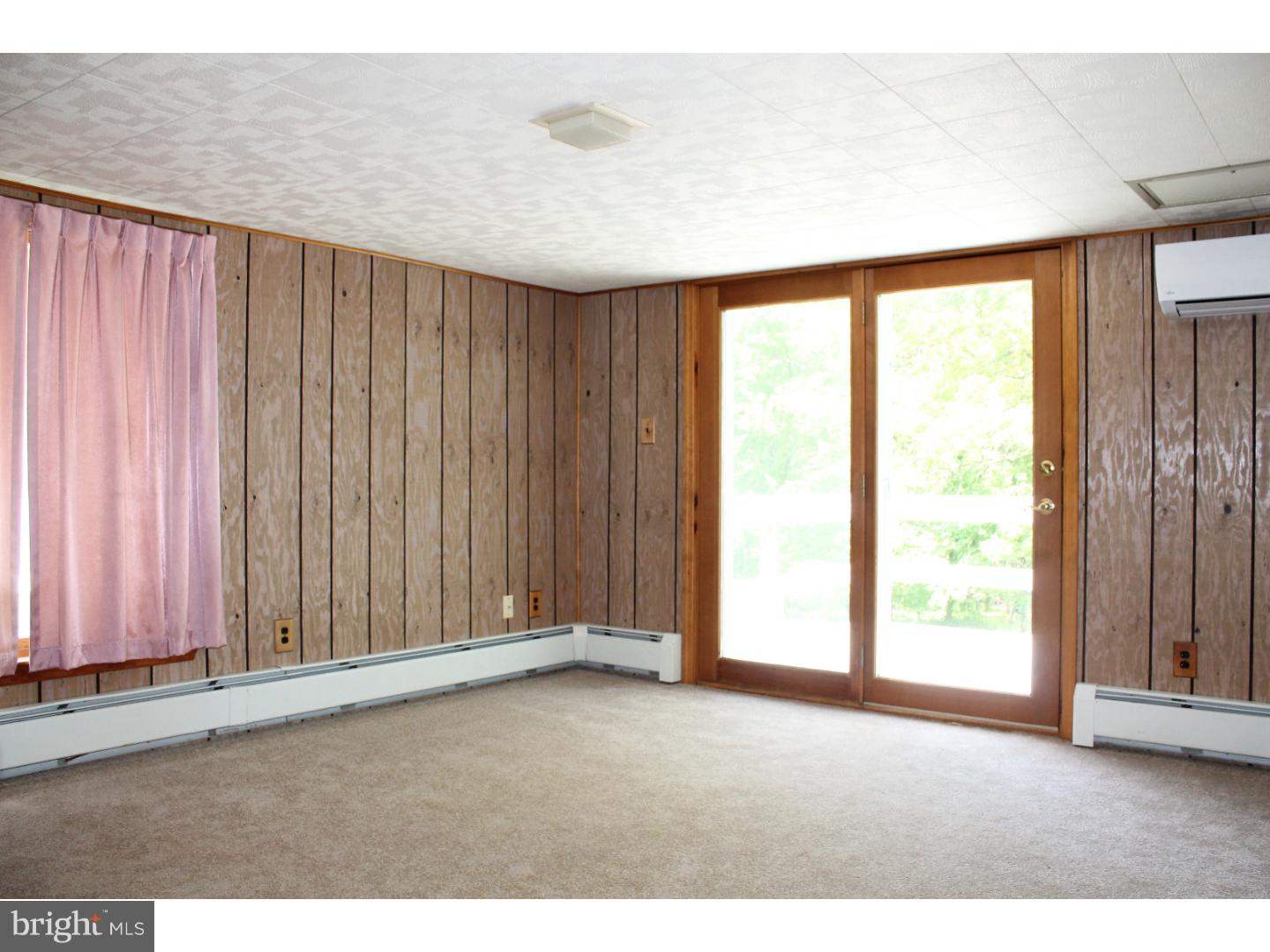 1724 Ramich Road Temple, PA 19560 - Photo 12 of 25 a view of an empty room with a window