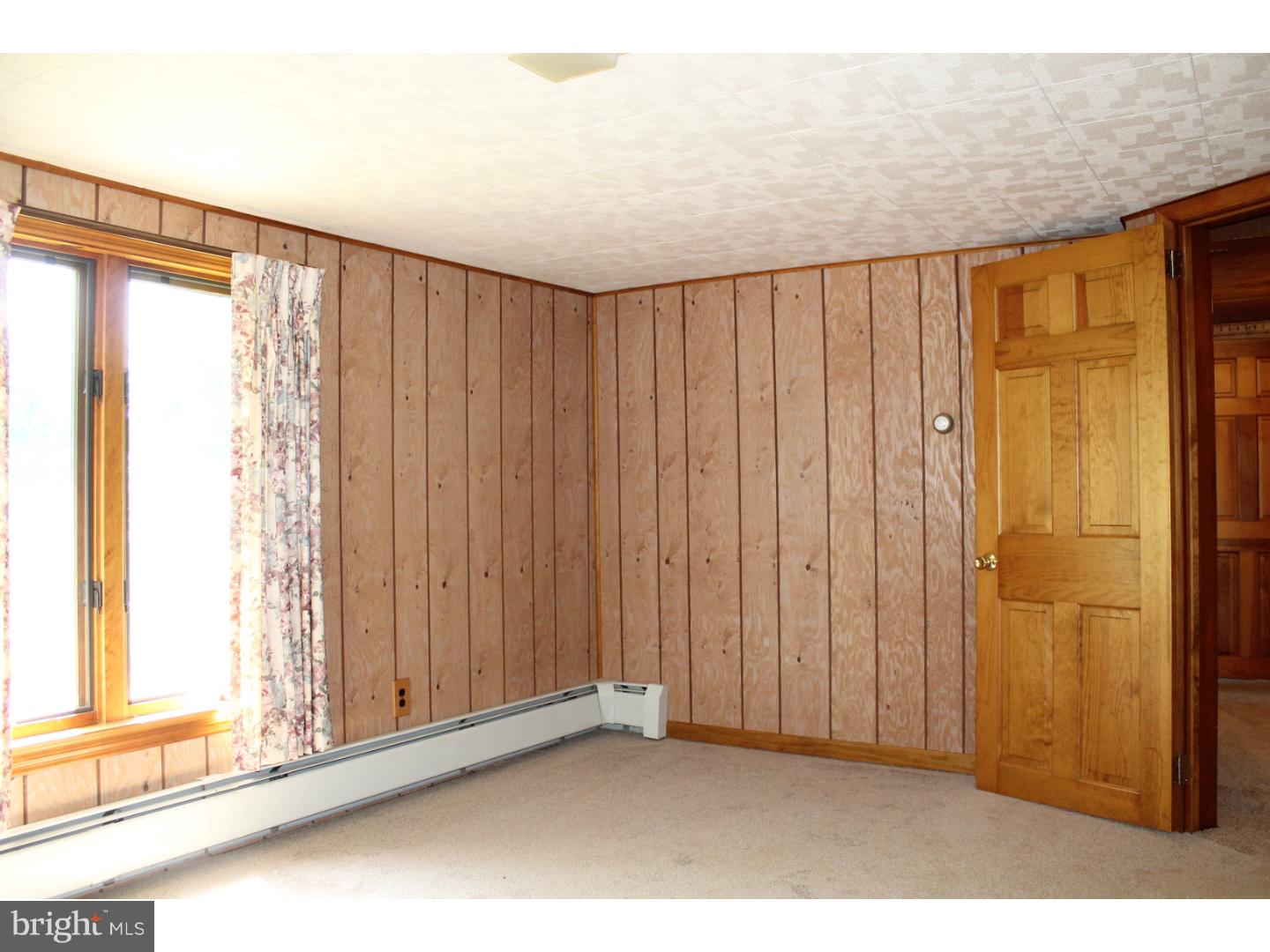 1724 Ramich Road Temple, PA 19560 - Photo 16 of 25 a view of a room with a wooden door