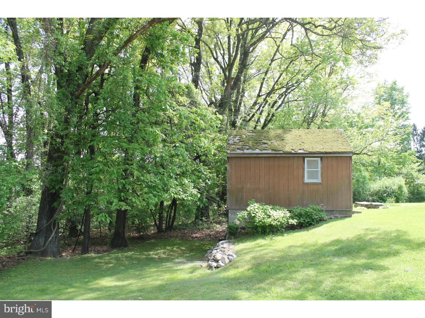 1724 Ramich Road Temple, PA 19560 - Photo 6 of 25 a backyard of a house with a tree