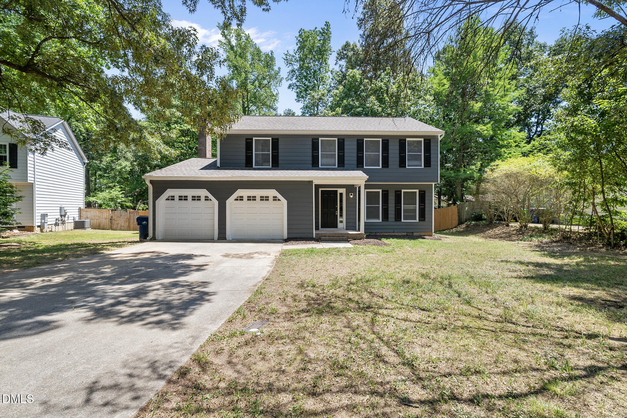 2108 Treverton Place Raleigh, NC 27609 - Photo 1 of 30 a front view of a house with a garden