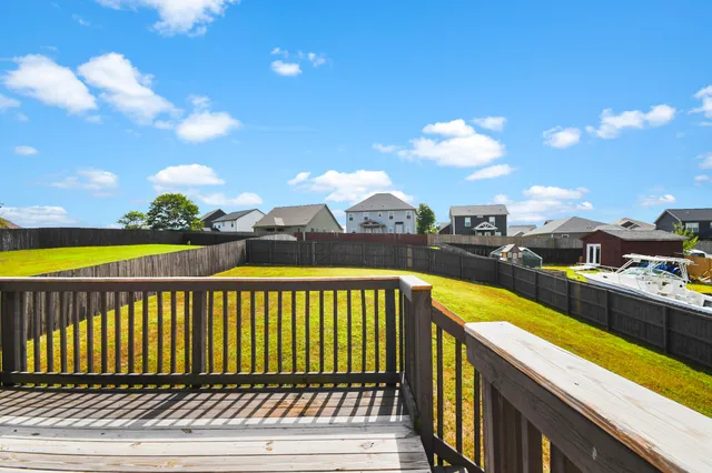 a view of a swimming pool with a lounge chairs