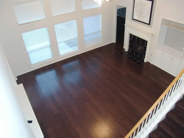 a view of a livingroom with wooden floor