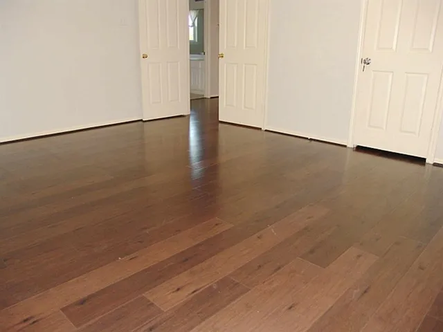 a view of a livingroom with wooden floor