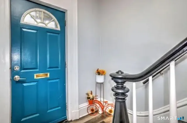 a view of hallway with washer and dryer