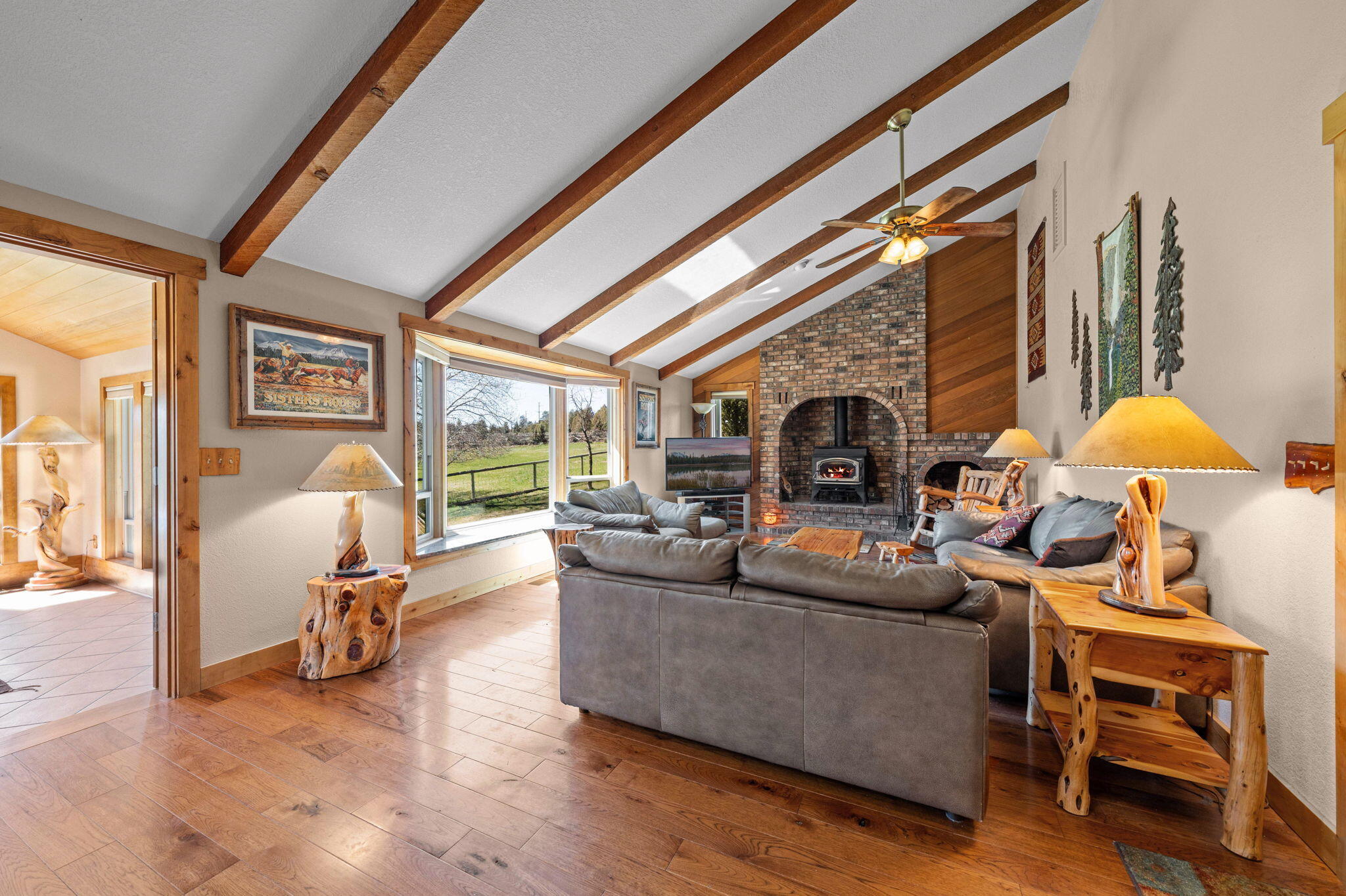 17375 Jordan Road Sisters, OR 97759 - Photo 25 of 63 Vaulten ceiling, exposed beams, huge bay windows. All new windows in 2023.