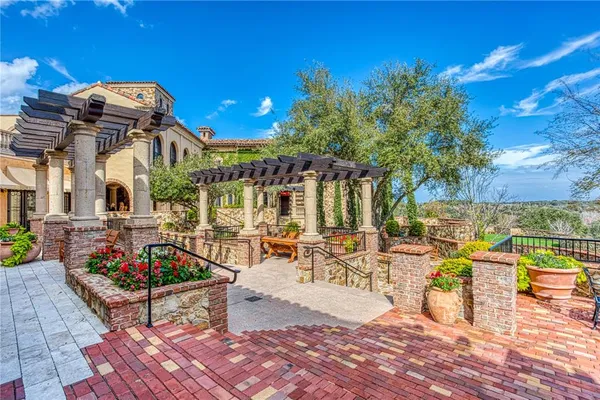 a view of a patio with swimming pool table and chairs