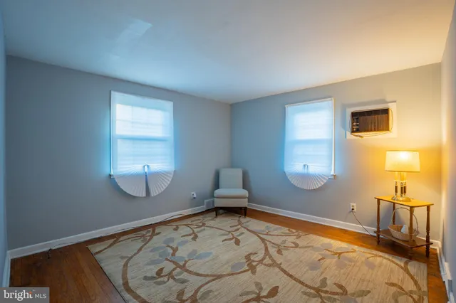 wooden floor with window in a room
