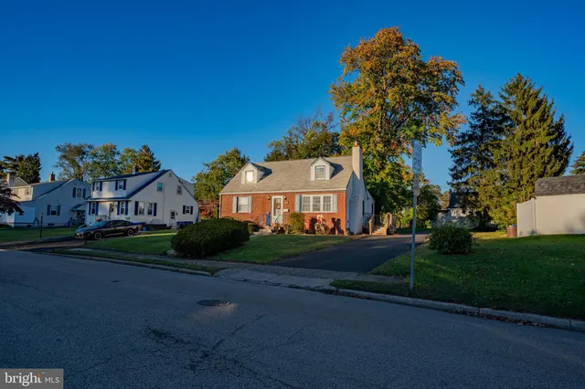 a view of house with outdoor space and street view