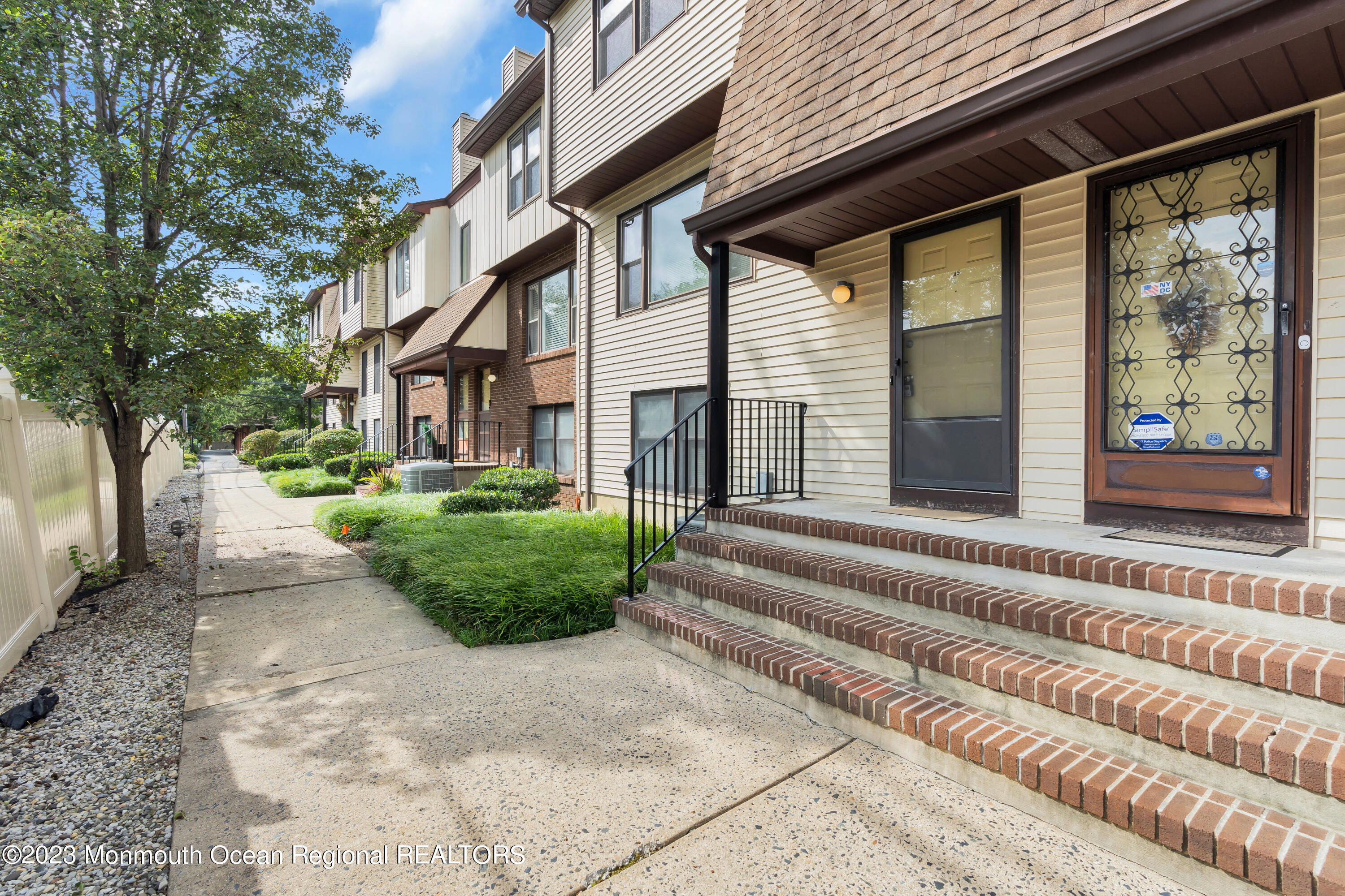 20 Pinckney Road, Unit A5 Red Bank, NJ 07701 - Photo 1 of 1 a view of a house with a backyard
