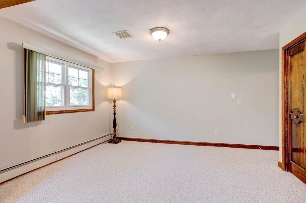 36 Rainbow Circle Peabody, MA 01960 - Photo 12 of 41 a view of an empty room with a window