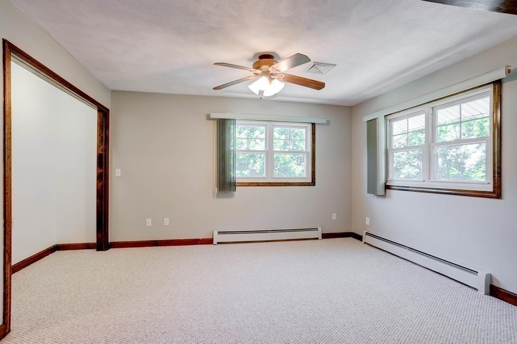 36 Rainbow Circle Peabody, MA 01960 - Photo 13 of 41 a view of an empty room with a window