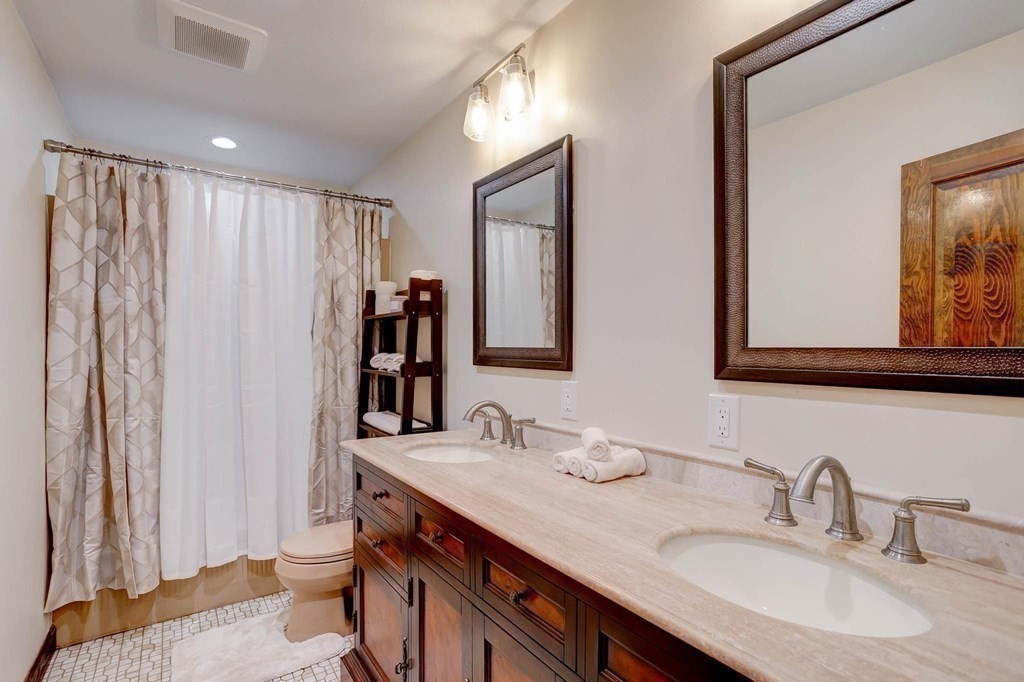 36 Rainbow Circle Peabody, MA 01960 - Photo 14 of 41 a bathroom with double vanity sink and a mirror