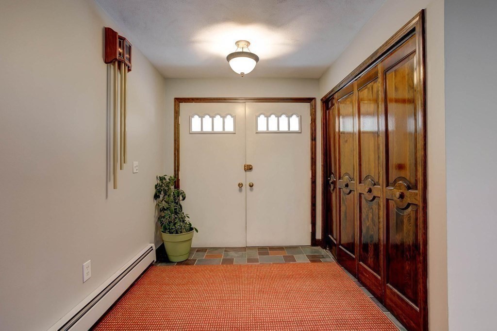 36 Rainbow Circle Peabody, MA 01960 - Photo 16 of 41 wooden floor in an empty room with a window
