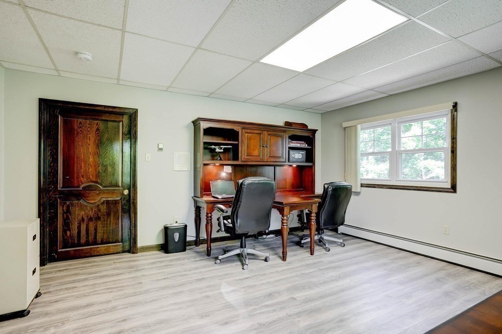36 Rainbow Circle Peabody, MA 01960 - Photo 27 of 41 a view of a workspace with furniture and a window