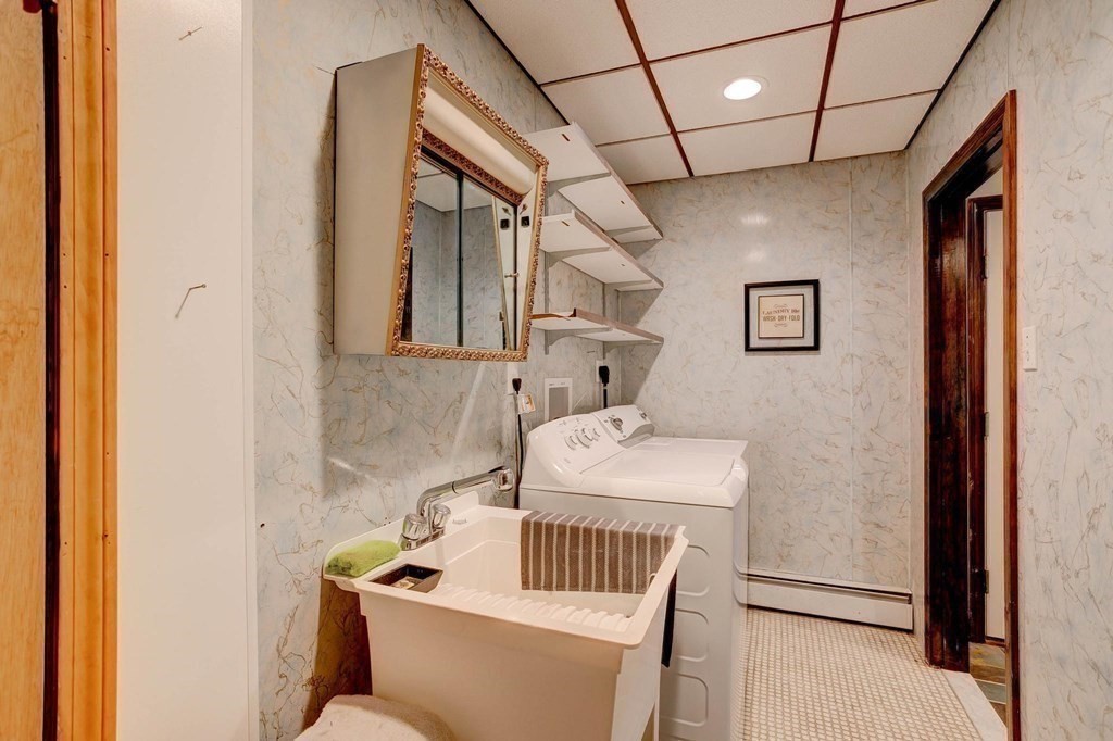36 Rainbow Circle Peabody, MA 01960 - Photo 28 of 41 a bathroom with a sink toilet and mirror