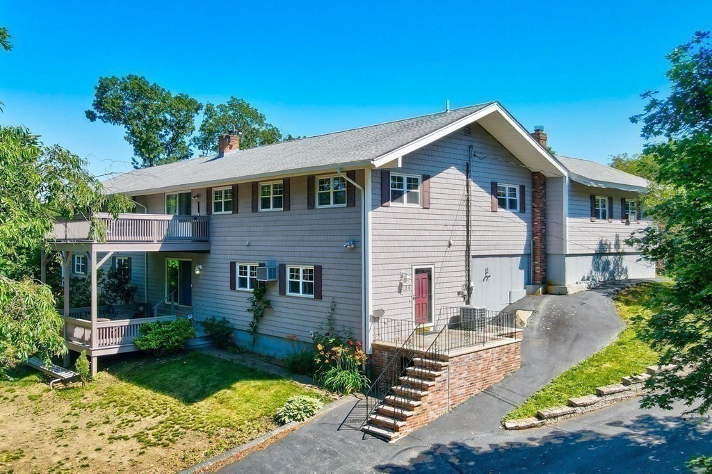 36 Rainbow Circle Peabody, MA 01960 - Photo 36 of 41 front view of a house with a yard