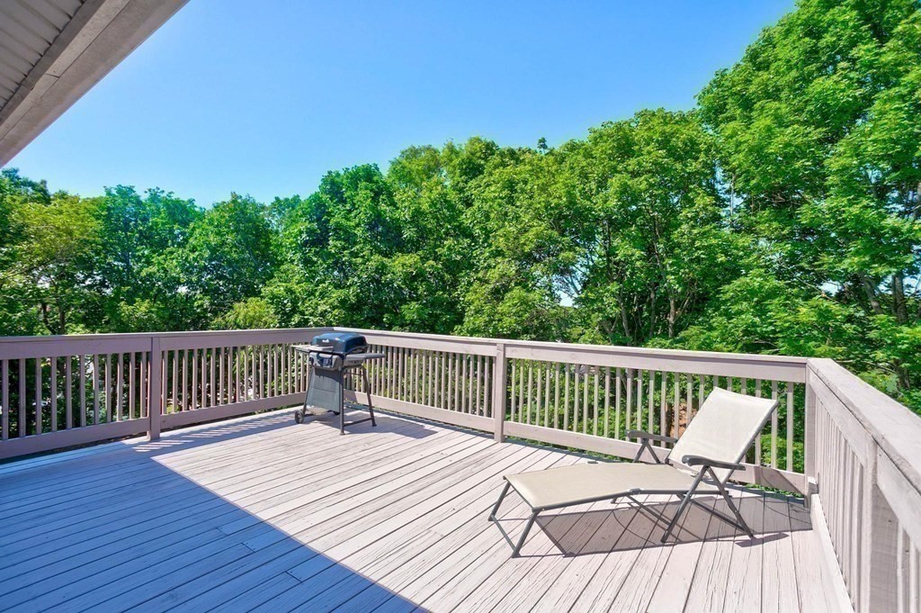 36 Rainbow Circle Peabody, MA 01960 - Photo 6 of 41 a view of deck with patio and wooden floor