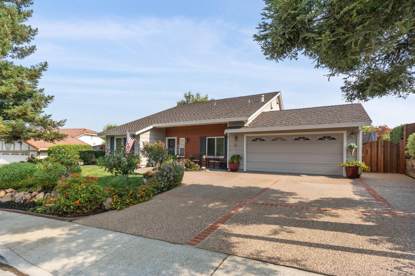 42 Seneca Lane San Ramon, CA 94583 - Photo 1 of 40 a front view of a house with a yard and garage