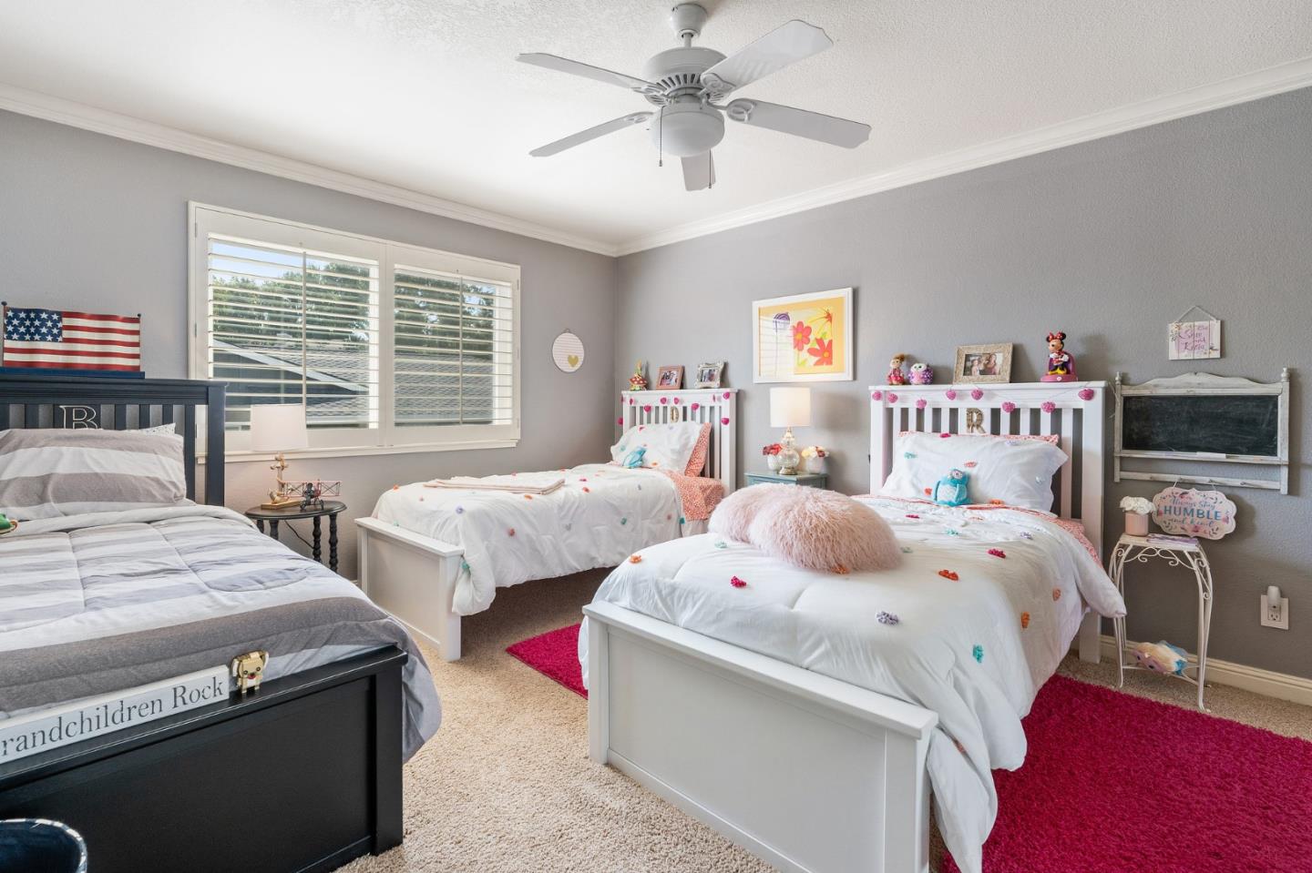 42 Seneca Lane San Ramon, CA 94583 - Photo 23 of 40 a bedroom with two beds and a chandelier
