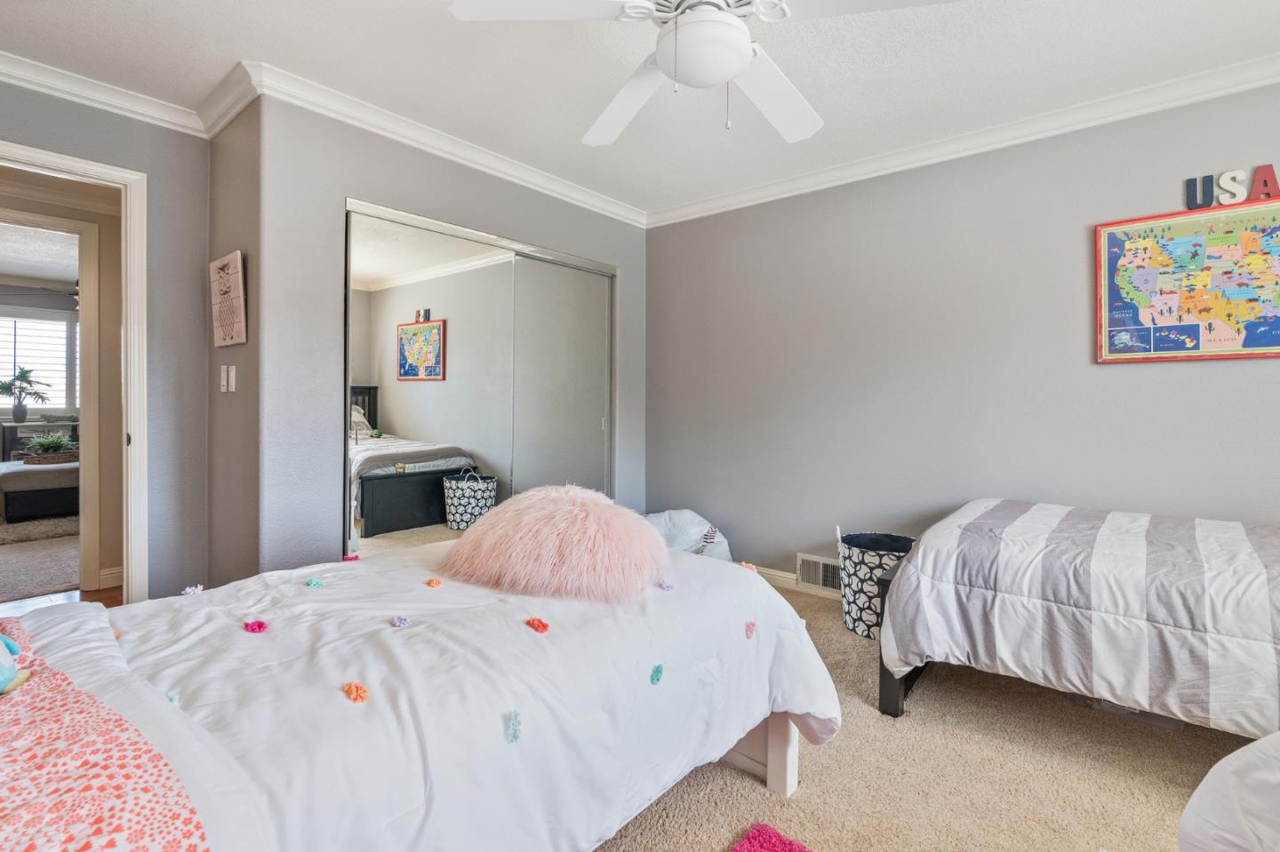 42 Seneca Lane San Ramon, CA 94583 - Photo 24 of 40 a bedroom with a bed and a chandelier