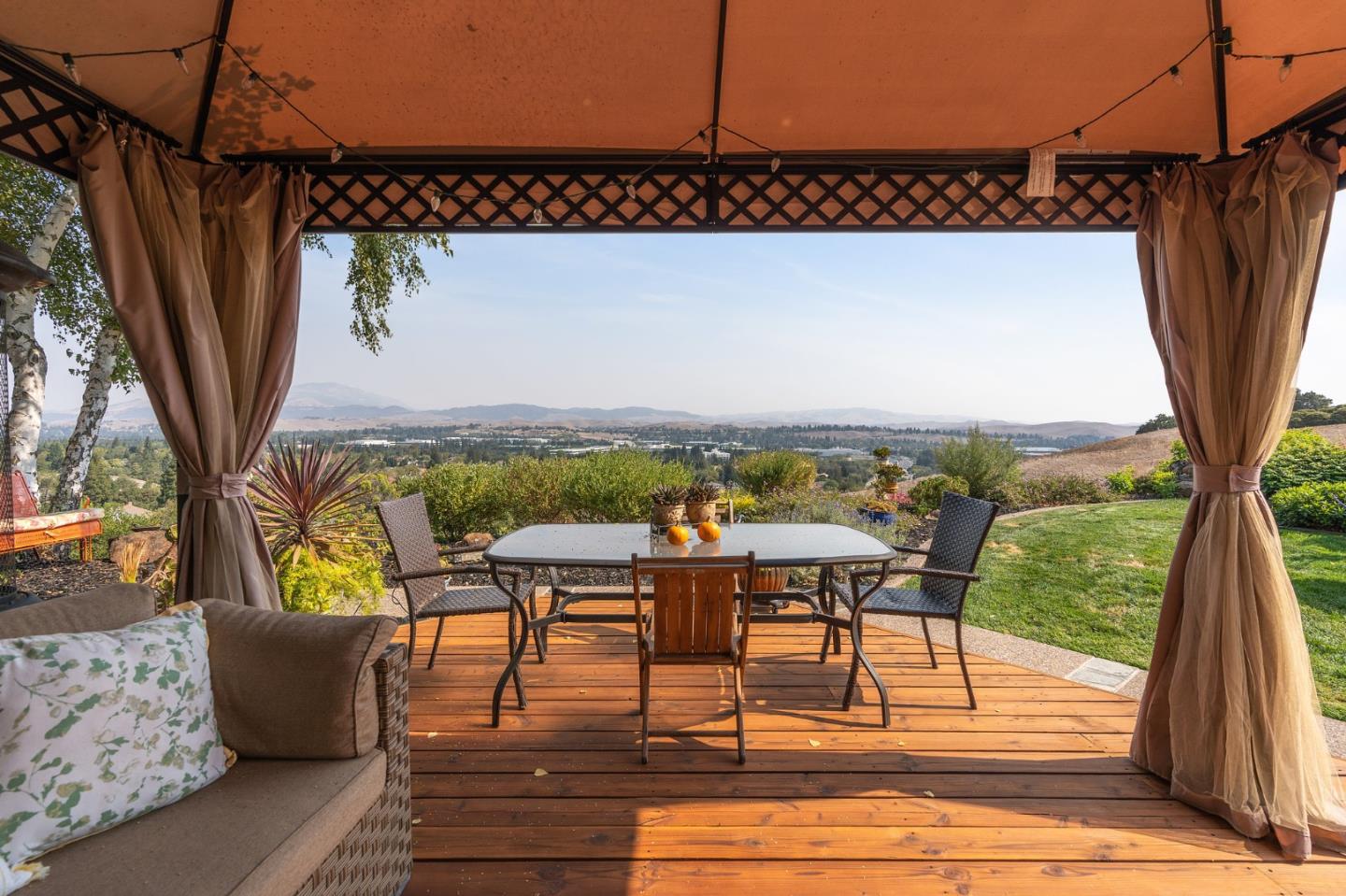 42 Seneca Lane San Ramon, CA 94583 - Photo 30 of 40 a roof deck with couches and wooden floor