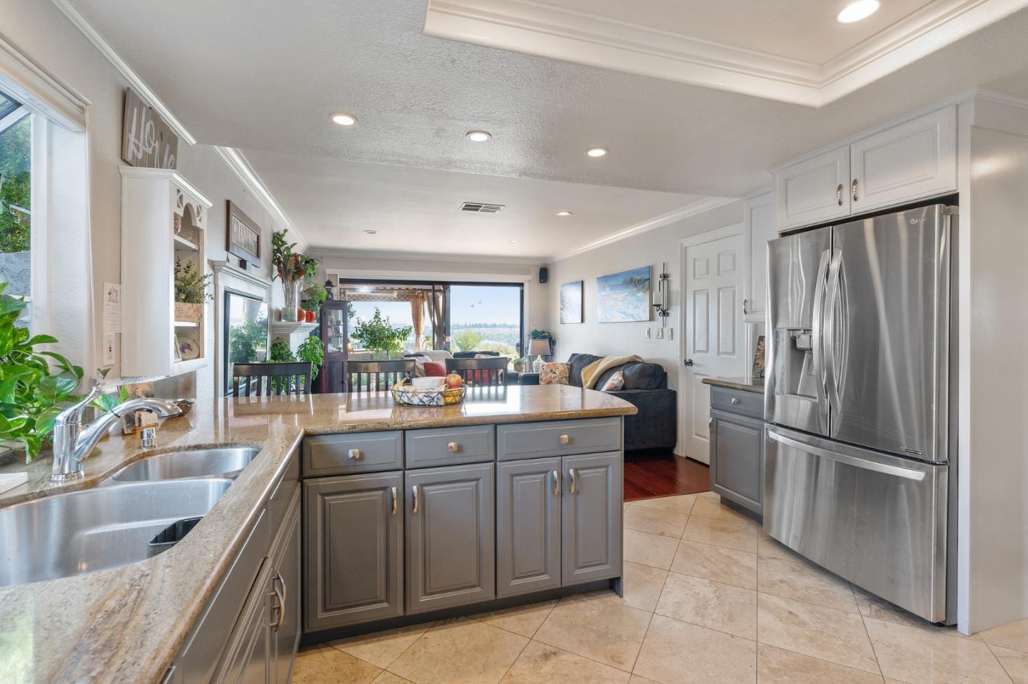 42 Seneca Lane San Ramon, CA 94583 - Photo 6 of 40 a kitchen with kitchen island a counter top space a sink stainless steel appliances and cabinets