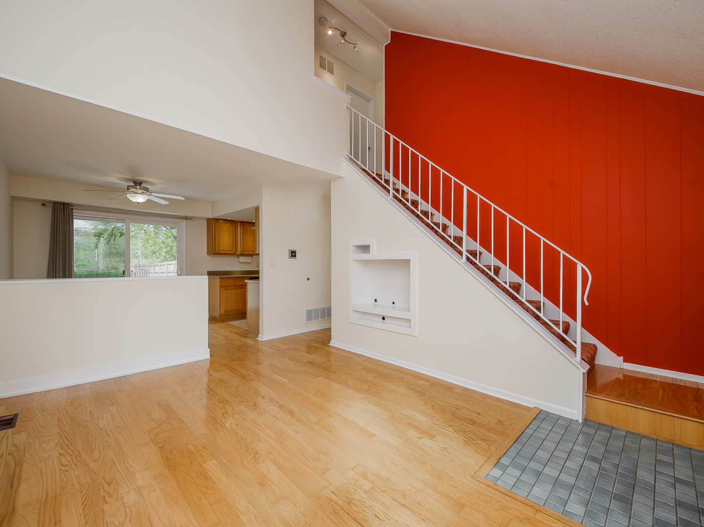 3320 Fox Hill Road Aurora, IL 60504 - Photo 2 of 10 a view of an empty room with wooden floor