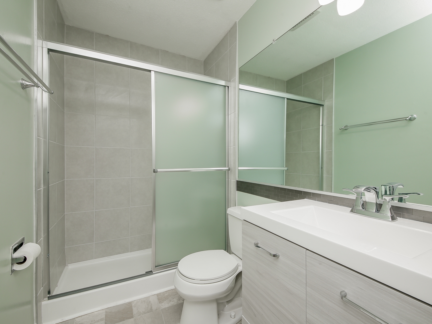 3320 Fox Hill Road Aurora, IL 60504 - Photo 9 of 10 a bathroom with a sink toilet and shower