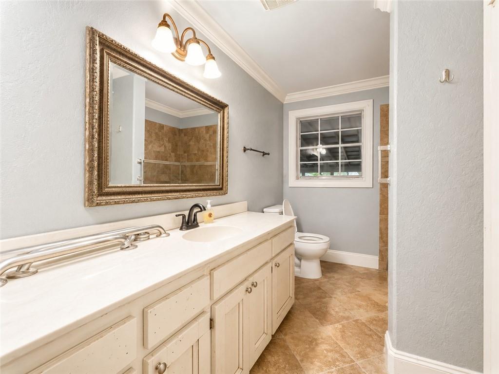 212 Craigtown Road Northeast Calhoun, GA 30701 - Photo 15 of 21 a bathroom with a double vanity sink toilet and a mirror