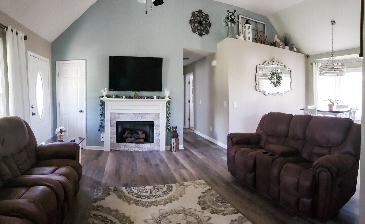 5771 Payne Road Portland, TN 37148 - Photo 5 of 11 a living room with furniture fireplace and flat screen tv