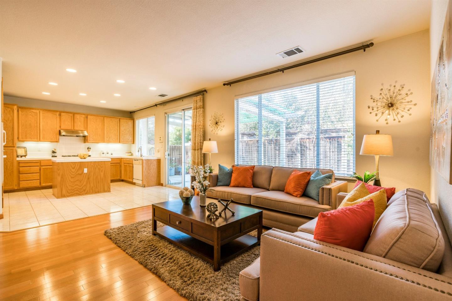 2235 Woodranch Road San Jose, CA 95131 - Photo 16 of 40 a living room with furniture and a large window